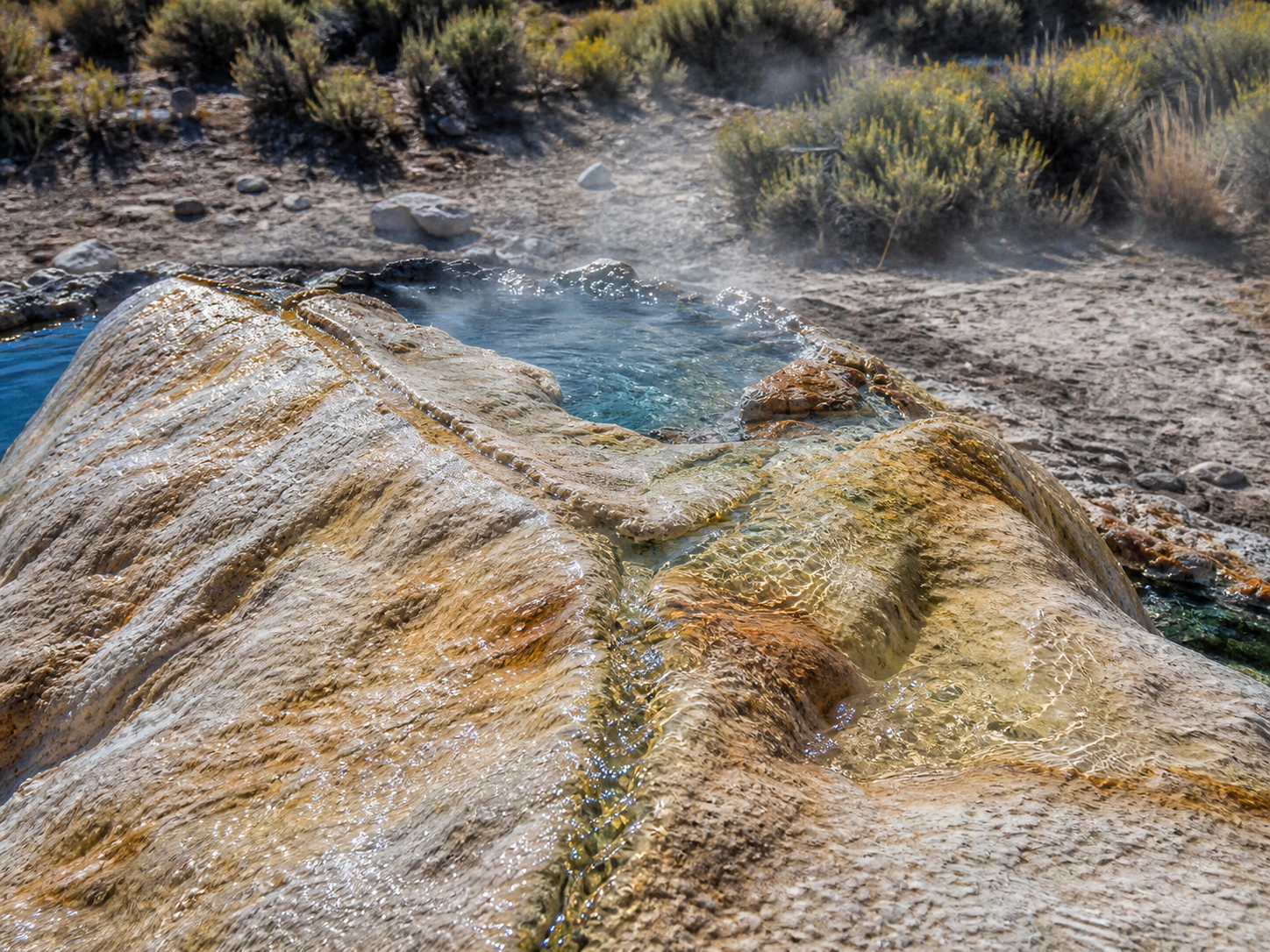 AI enhanced close detail of mineral terraces and hot spring water